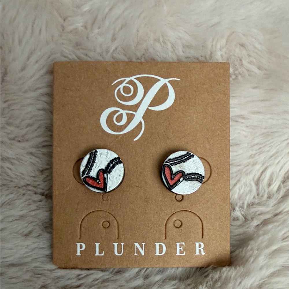 Plunder White Stud Earrings with Red Heart Accent